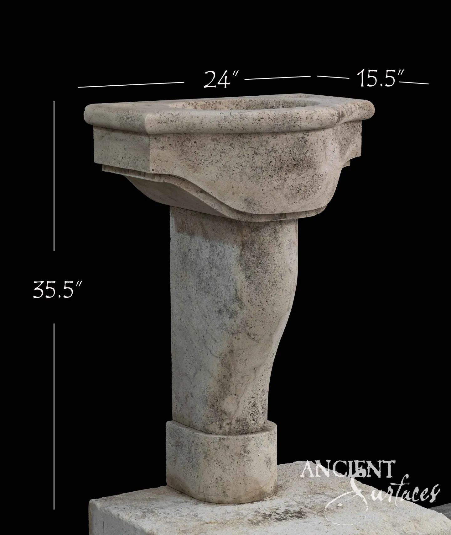 Antique travertine pedestal basin from Ancient Surfaces on a single tapered column with a round moulded foot