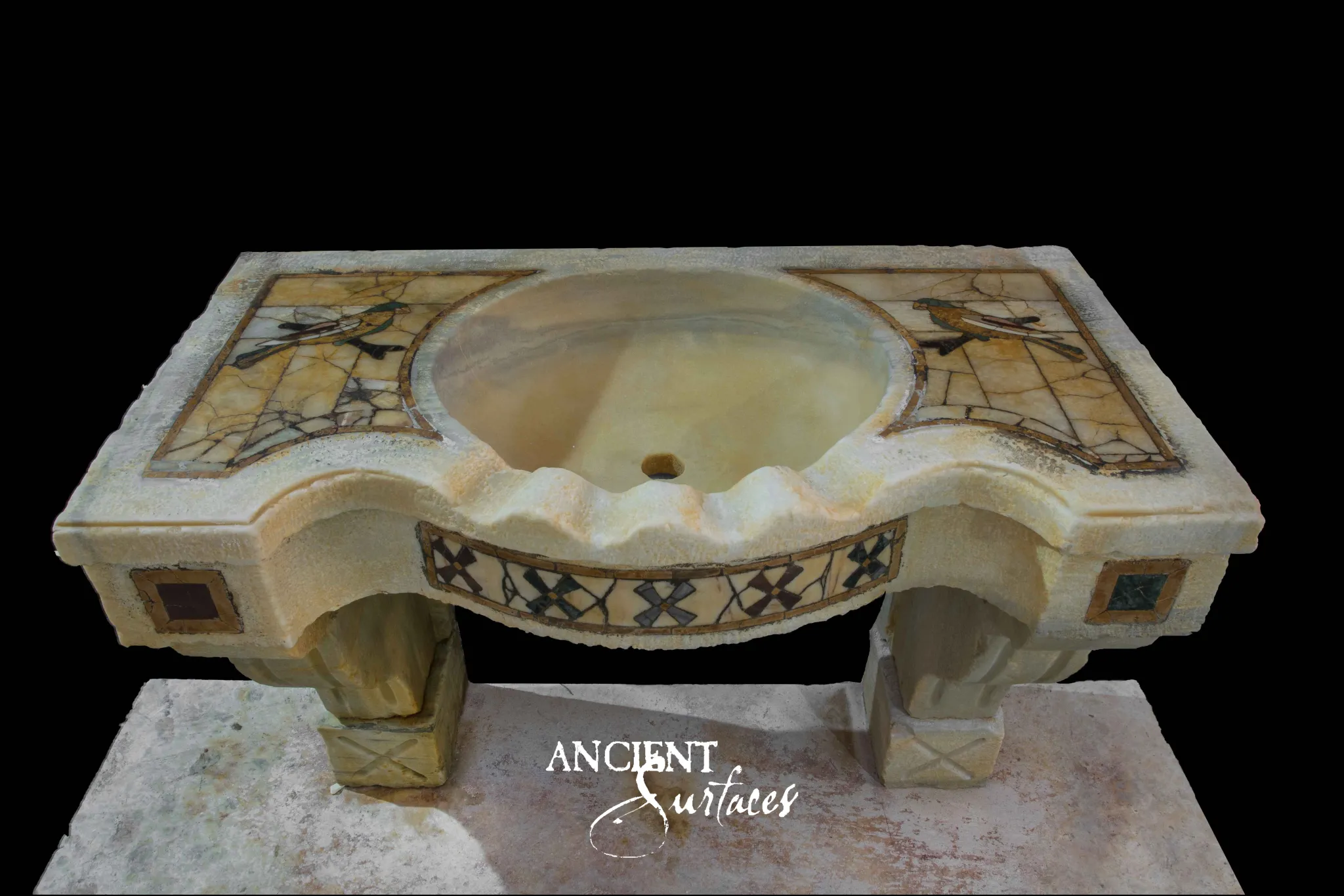 Hand carved antique limestone sink by Ancient Surfaces with pietra dura marble inlay panels and a polished onyx basin